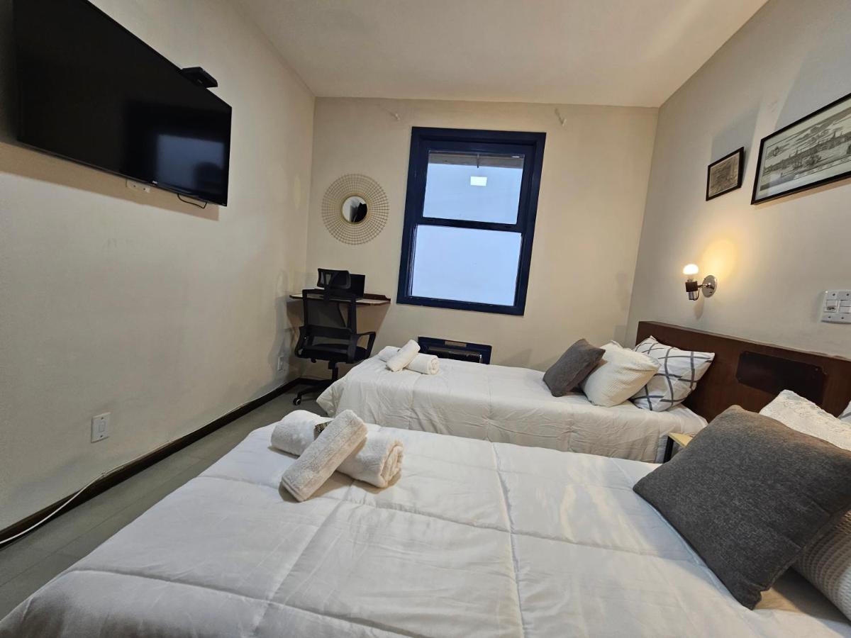 Quarto Triplo do Hotel Princesinha do Café